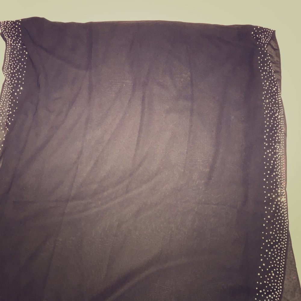 Silky black dressy scarf with jewels on side.